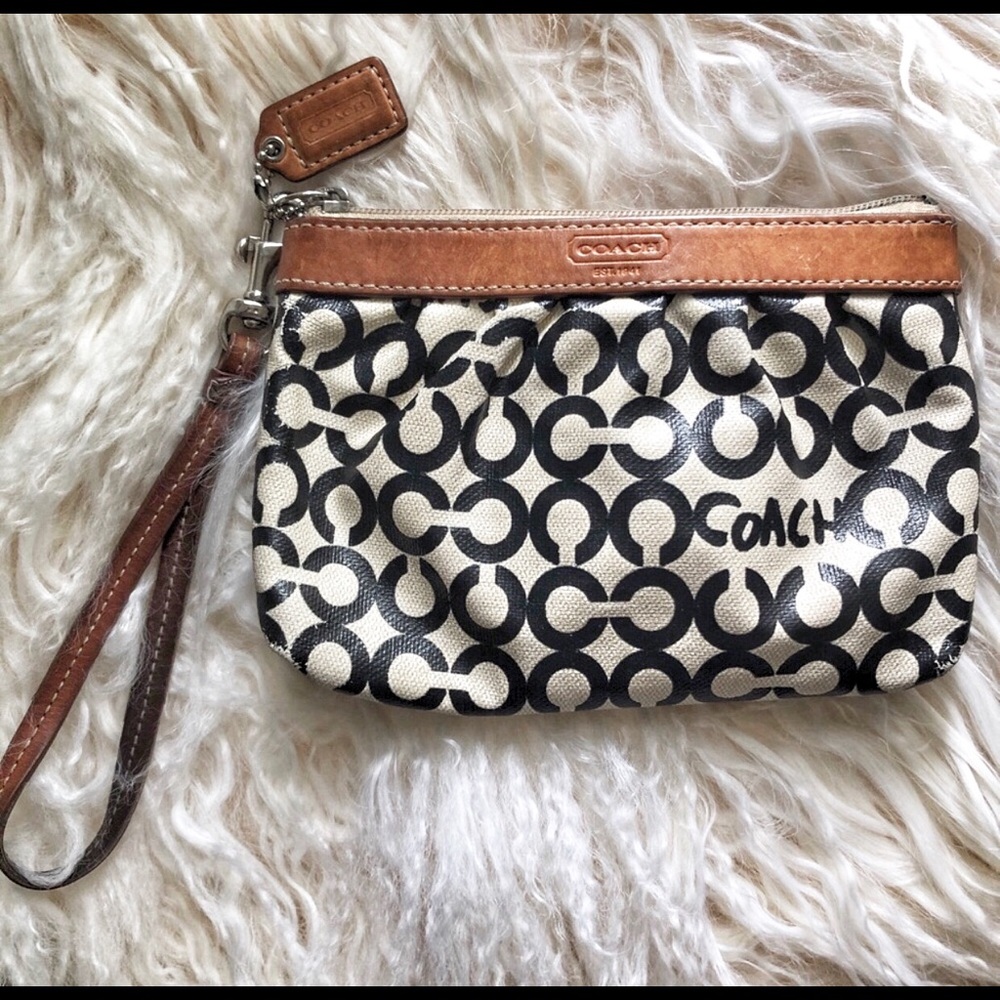 Coach wristlet ivory/black/tan. Lovingly used♥️